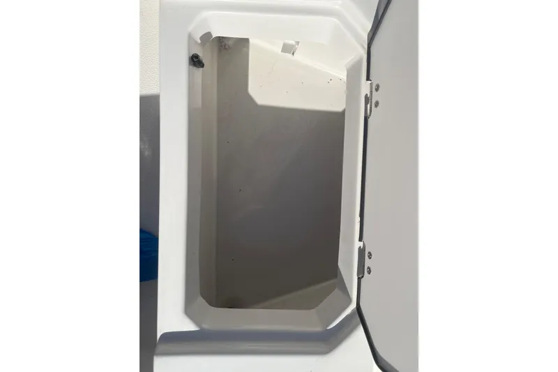 Slide: The Image of Storage compartment of 2025 Starcraft SVX 171 OB boat, open and empty. - 6