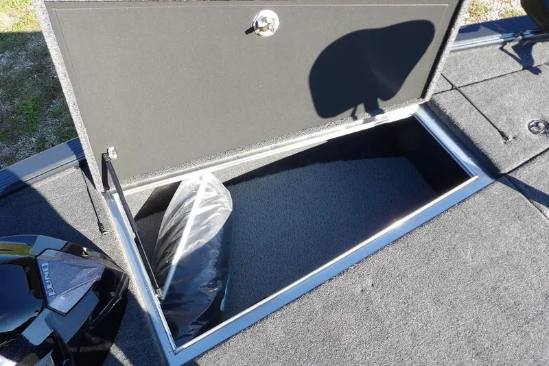 Slide: The Image of Open storage compartment in 2026 Lund 2075 Pro-V Bass XS boat. - 33
