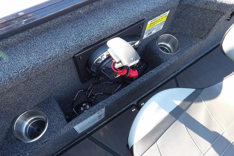 Slide: The Image of Interior of 2026 Lund 2075 Pro-V Bass XS boat with cup holders and controls. - 50