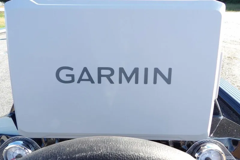 Slide: The Image of Garmin device on 2026 Lund 2075 Pro-V Bass XS boat dashboard. - 51