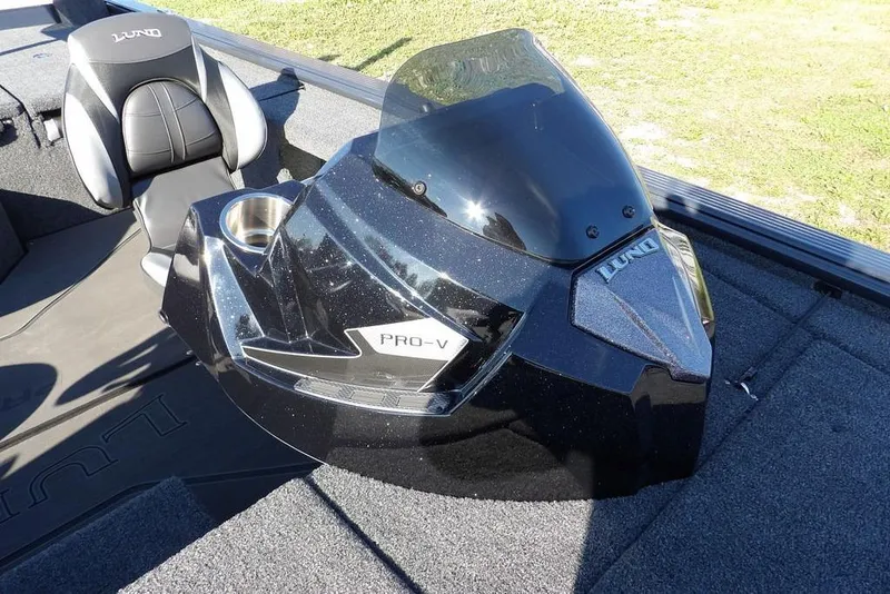 Slide: The Image of 2026 Lund 2075 Pro-V Bass XS boat interior with sleek console and seating. - 56
