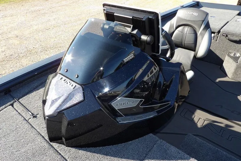 Slide: The Image of 2026 Lund 2075 Pro-V Bass XS boat cockpit with sleek design and advanced controls. - 57