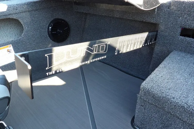 Slide: The Image of Interior of 2026 Lund 2075 Pro-V Bass XS with measuring tool. - 58