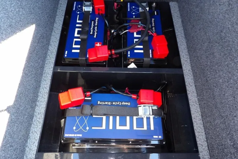 Slide: The Image of Batteries installed in a 2026 Lund 2075 Pro-V Bass XS boat compartment. - 61