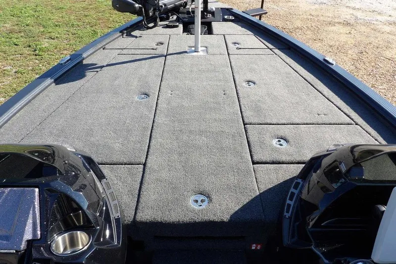 Slide: The Image of 2026 Lund 2075 Pro-V Bass XS boat deck with storage compartments. - 63