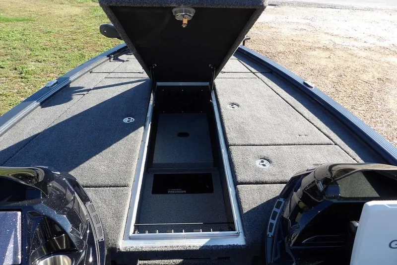 Slide: The Image of 2026 Lund 2075 Pro-V Bass XS boat with open storage compartment on deck. - 64