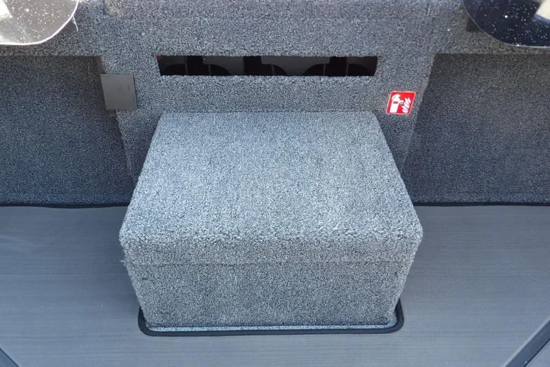 Slide: The Image of Interior of 2026 Lund 2075 Pro-V Bass XS boat with carpeted storage compartment. - 67