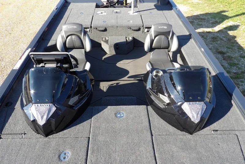 Slide: The Image of 2026 Lund 2075 Pro-V Bass XS boat interior with dual seats and advanced controls. - 78