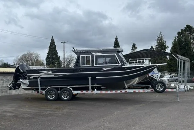 The Image of 2026 Thunder Jet 26 Alexis Pro XL boat on trailer, parked outdoors. - 1
