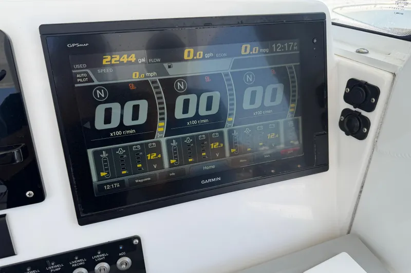 Slide: The Image of Garmin GPS display on 2018 Everglades 355 Center Console boat dashboard. - 28
