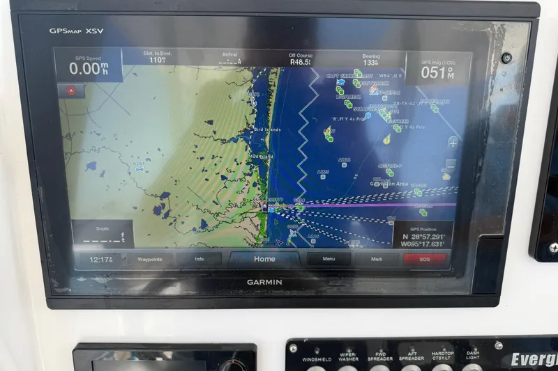 Slide: The Image of Garmin GPS display on 2018 Everglades 355 Center Console boat, showing navigation map and coordinates. - 29