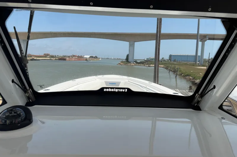 Slide: The Image of View from 2018 Everglades 355 Center Console boat navigating under a bridge. - 31