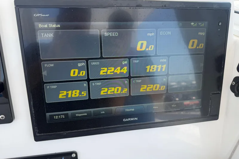 Slide: The Image of Garmin GPS display on 2018 Everglades 355 Center Console showing boat status metrics. - 33