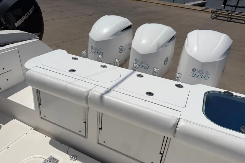 Slide: The Image of 2018 Everglades 355 Center Console with Yamaha 300 engines at dockside. - 37