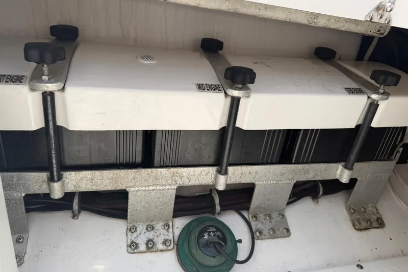 Slide: The Image of Battery compartment of a 2018 Everglades 355 Center Console boat. - 43