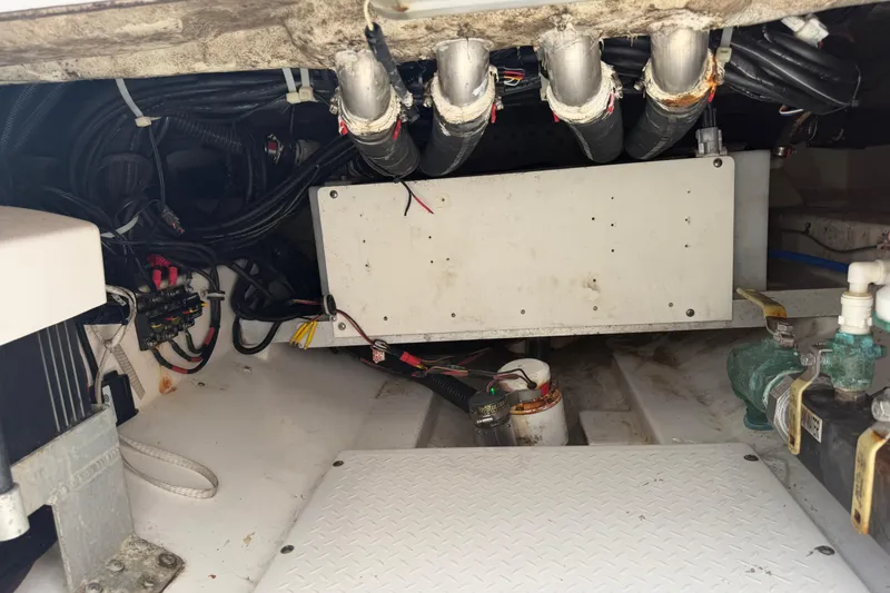 Slide: The Image of Engine compartment of a 2018 Everglades 355 Center Console boat, showing wiring and components. - 44