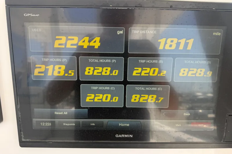 Slide: The Image of Garmin GPS display showing fuel usage and trip data for 2018 Everglades 355 Center Console. - 54