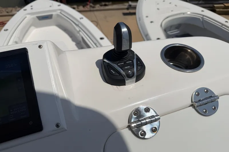 Slide: The Image of Control panel of 2018 Everglades 355 Center Console boat with joystick and display. - 55