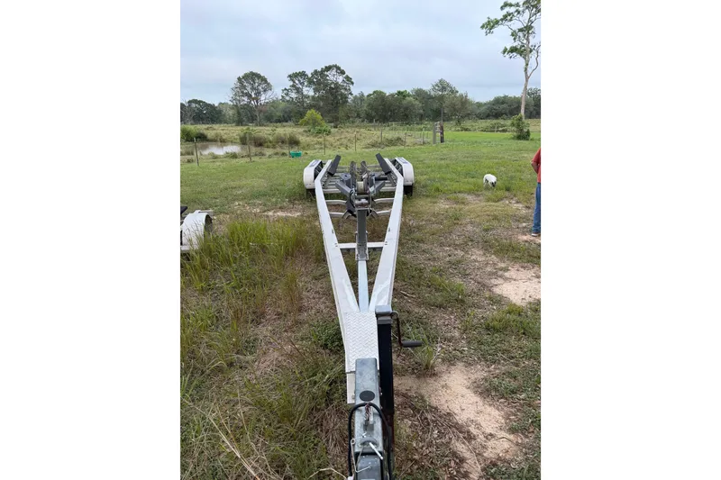 Slide: The Image of Trailer for 2018 Everglades 355 Center Console on grassy field. - 73