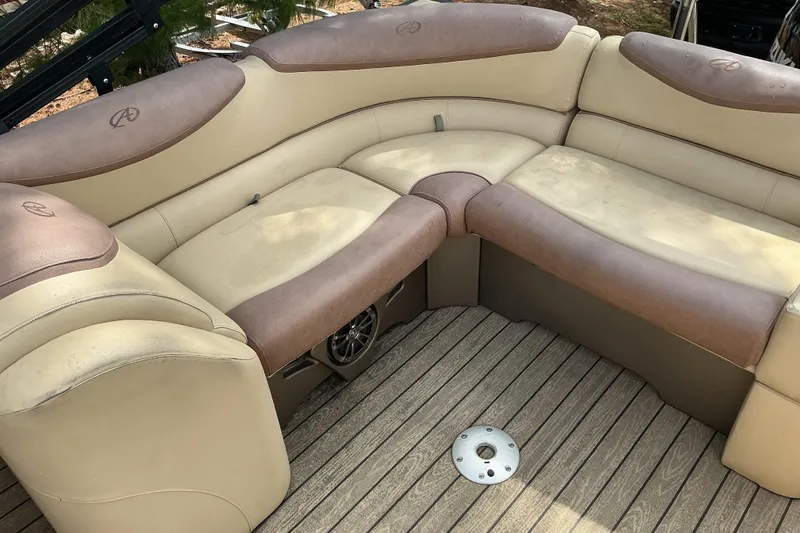 Slide: The Image of 2019 Avalon Catalina Platinum Rear J Lounge boat seating, beige and brown upholstery. - 11