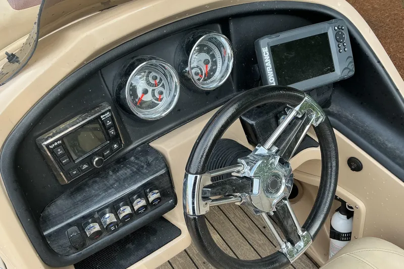 Slide: The Image of Steering console of 2019 Avalon Catalina Platinum boat with gauges and navigation system. - 8