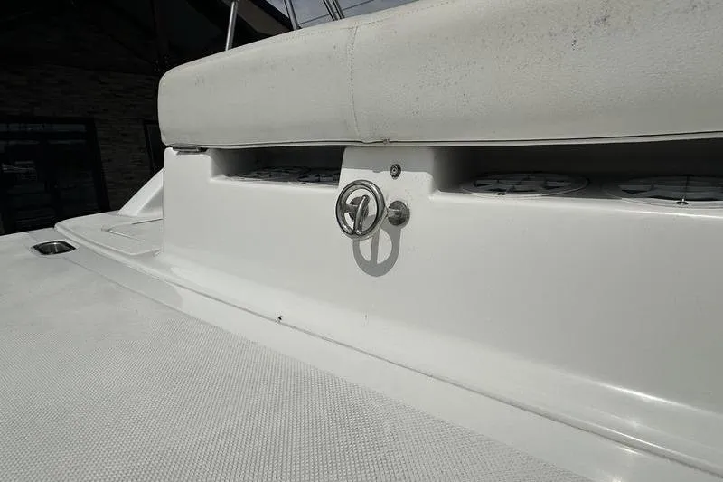 Slide: The Image of 2014 Hurricane SunDeck 187 IO boat interior detail with seating and storage. - 15