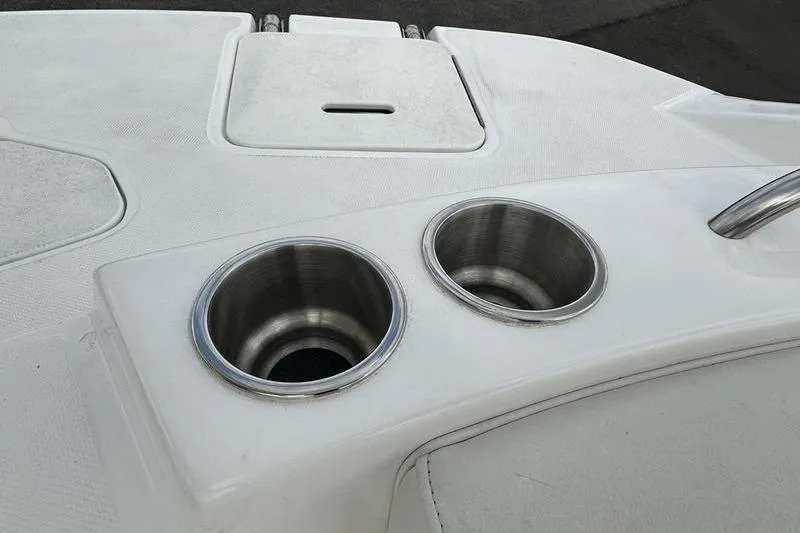 Slide: The Image of 2014 Hurricane SunDeck 187 IO boat with stainless steel cup holders. - 24