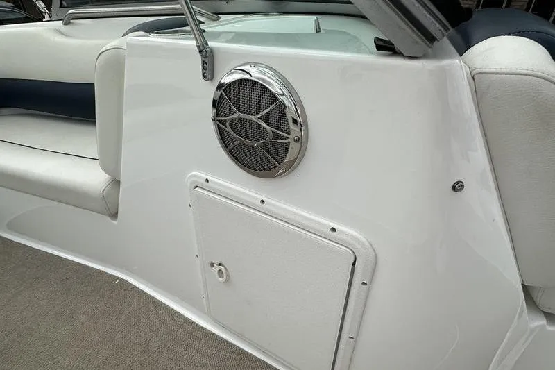 Slide: The Image of Interior of 2014 Hurricane SunDeck 187 IO boat with speaker and seating. - 33