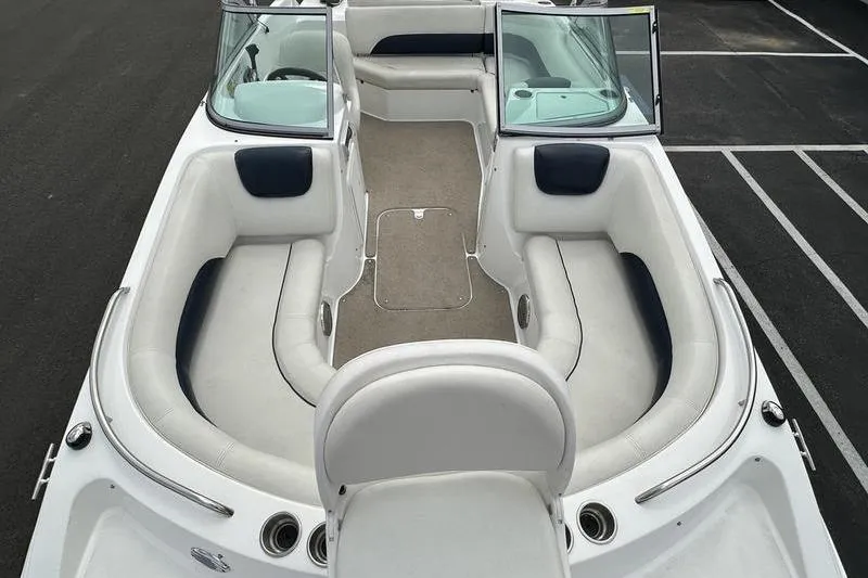 Slide: The Image of 2014 Hurricane SunDeck 187 IO boat interior with spacious seating and open deck layout. - 35