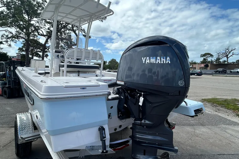 Slide: The Image of 2026 Robalo 206 Cayman boat with Yamaha outboard motor on a trailer. - 8
