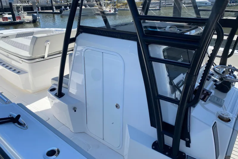 Slide: The Image of 2019 Invincible 40 Catamaran cruising on clear turquoise waters. - 10