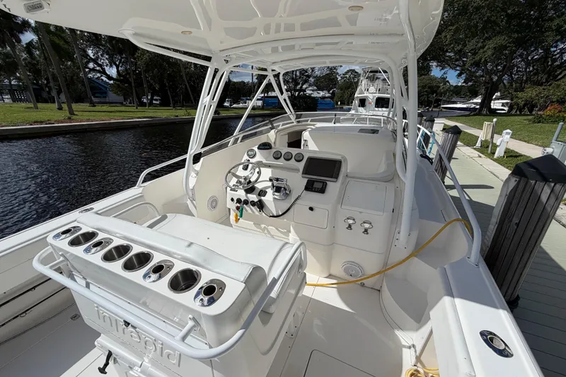 Slide: The Image of 2008 Intrepid 350 Center Console boat interior with steering wheel and control panel. - 15