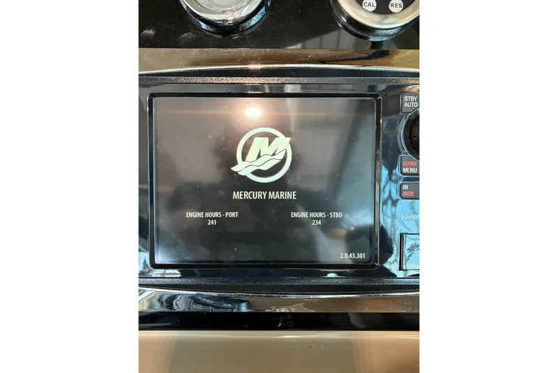 Slide: The Image of Display screen of a 2014 Formula 350 Crossover Bowrider showing Mercury Marine engine hours. - 21