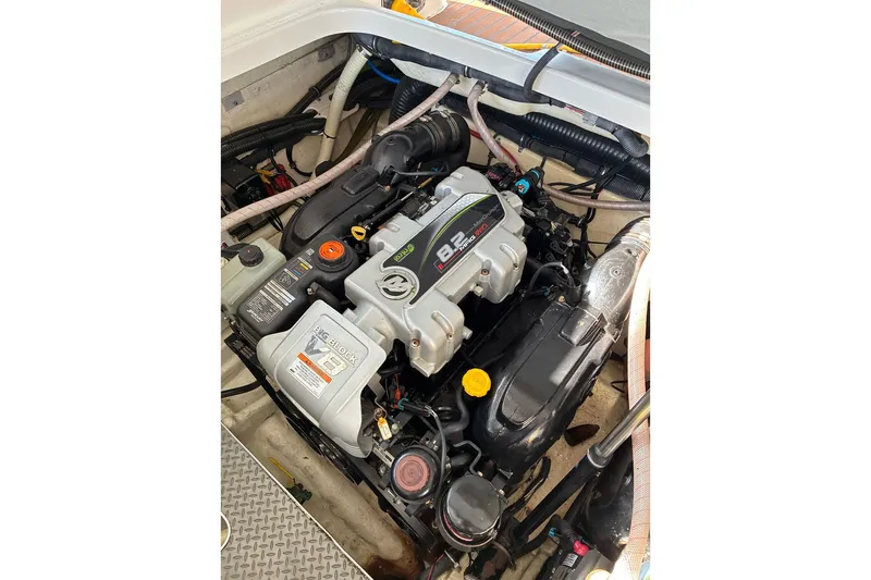 Slide: The Image of Engine compartment of a 2014 Formula 350 Crossover Bowrider boat. - 22