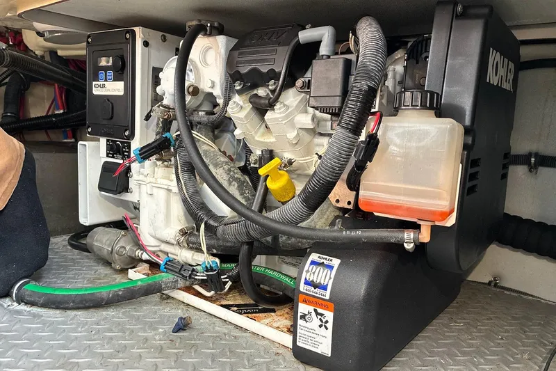 Slide: The Image of Engine compartment of a 2014 Formula 350 Crossover Bowrider with Kohler generator. - 23