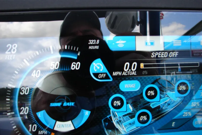Slide: The Image of Dashboard of a 2017 Malibu Wakesetter 24 MXZ boat showing speed and settings. - 28