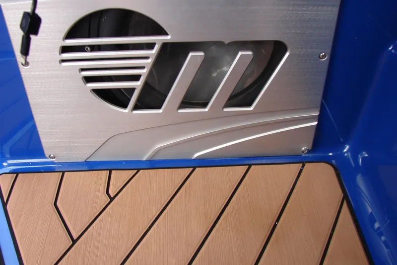 Slide: The Image of 2017 Malibu Wakesetter 24 MXZ interior detail with custom speaker and teak flooring. - 32