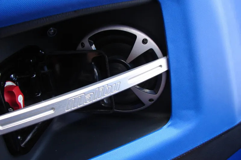 Slide: The Image of Close-up of 2017 Malibu Wakesetter 24 MXZ speaker with blue upholstery. - 33