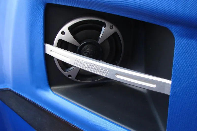 Slide: The Image of Close-up of a 2017 Malibu Wakesetter 24 MXZ speaker with branded grille. - 34