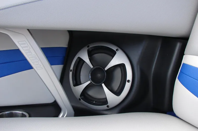 Slide: The Image of 2017 Malibu Wakesetter 24 MXZ interior speaker detail with blue and white upholstery. - 37