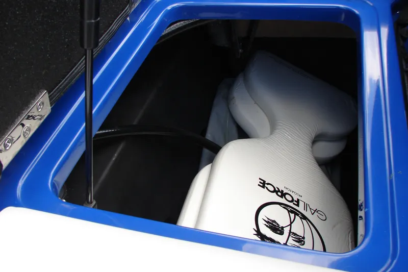 Slide: The Image of Storage compartment of 2017 Malibu Wakesetter 24 MXZ with ballast bag. - 44