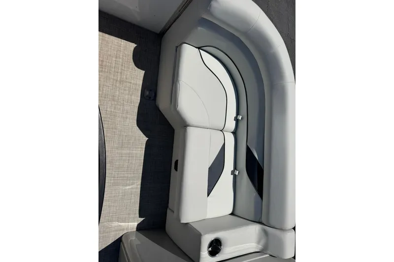 Slide: The Image of 2022 SunCatcher Select 16C boat interior seating with modern design and light upholstery. - 12