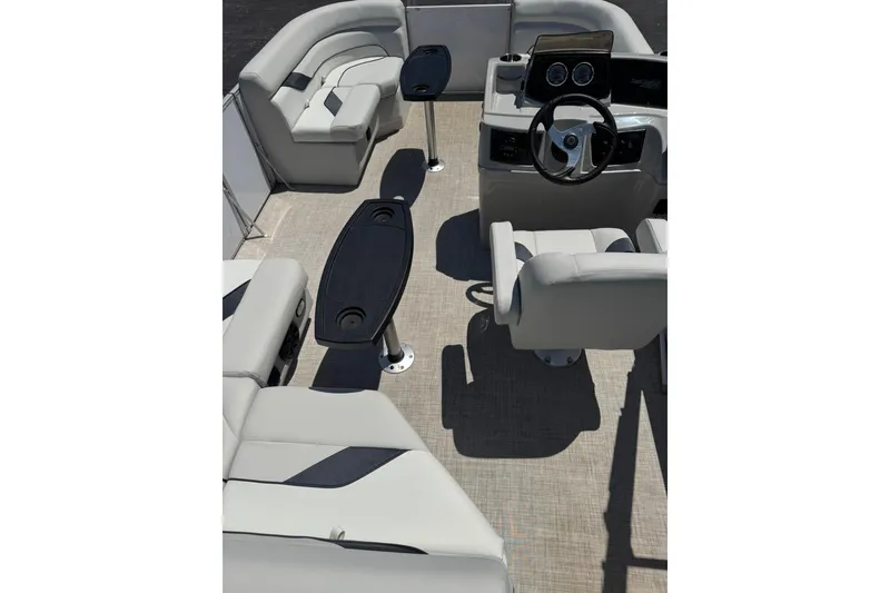 Slide: The Image of Interior of 2022 SunCatcher Select 16C pontoon boat with seating and steering console. - 15