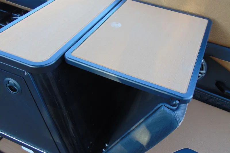 Slide: The Image of Luxurious seating in 2026 Yamaha Boats 255XD, featuring tan and blue upholstery. - 11