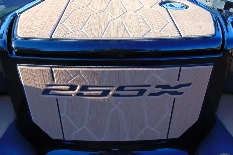 Slide: The Image of Luxurious interior seating of 2026 Yamaha Boats 255XD with stylish speaker design. - 18