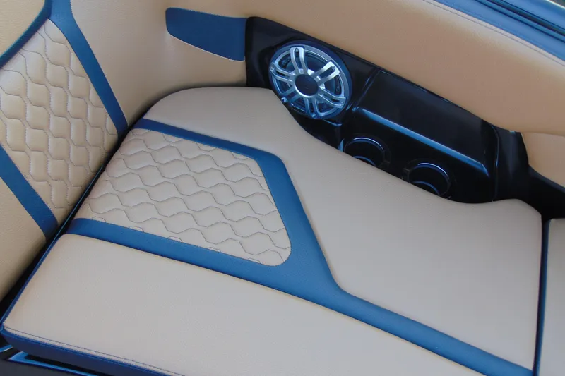 Slide: The Image of 2026 Yamaha Boats 255XD control panel with sleek black and tan design. - 20