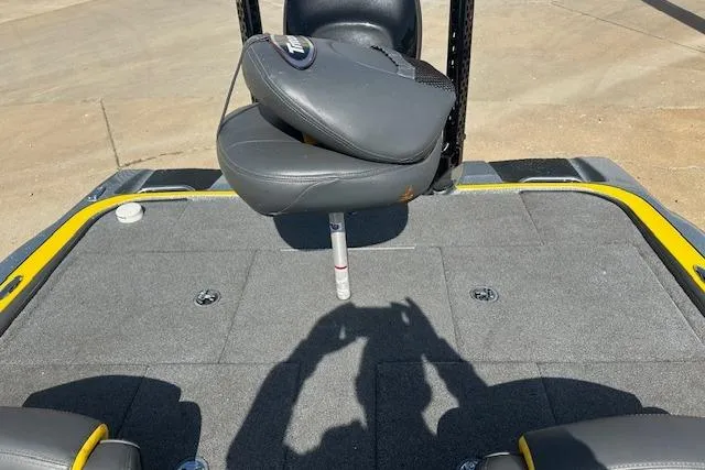 Slide: The Image of 2008 Triton 21X2 DC boat interior with gray seating and carpeted deck. - 3