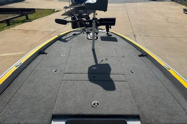 Slide: The Image of 2008 Triton 21X2 DC boat deck with fishing seat and equipment. - 4