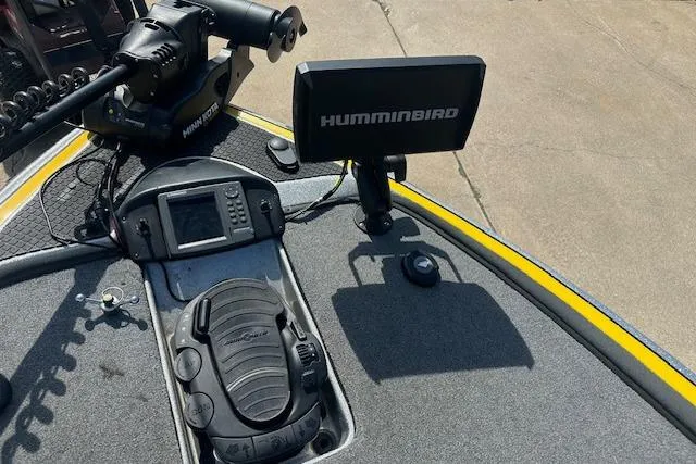 Slide: The Image of 2008 Triton 21X2 DC boat dashboard with Humminbird electronics and trolling motor. - 6