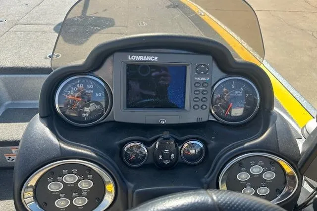 Slide: The Image of Dashboard of a 2008 Triton 21X2 DC boat with Lowrance navigation system. - 8